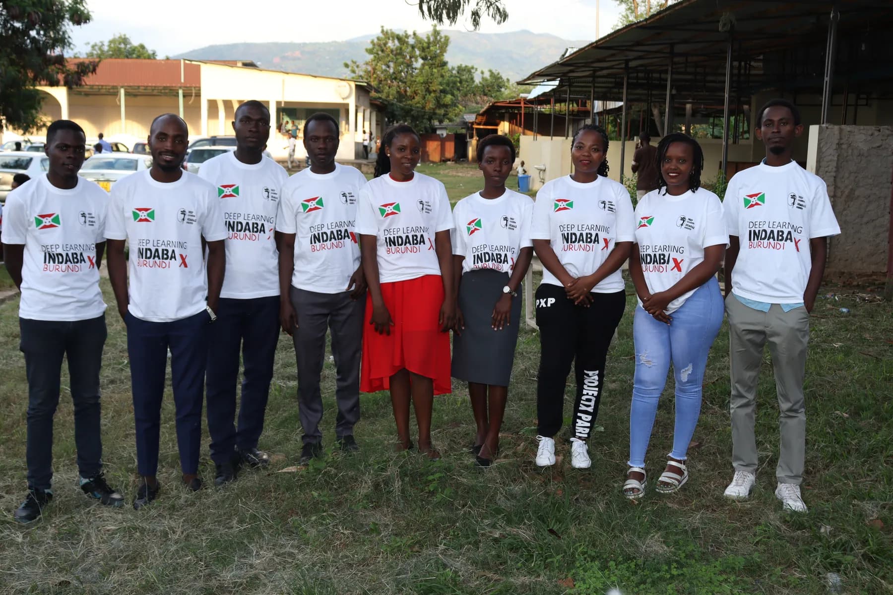 The organising team in IndabaX Burundi t-shirts at the first organising meeting, May 2023